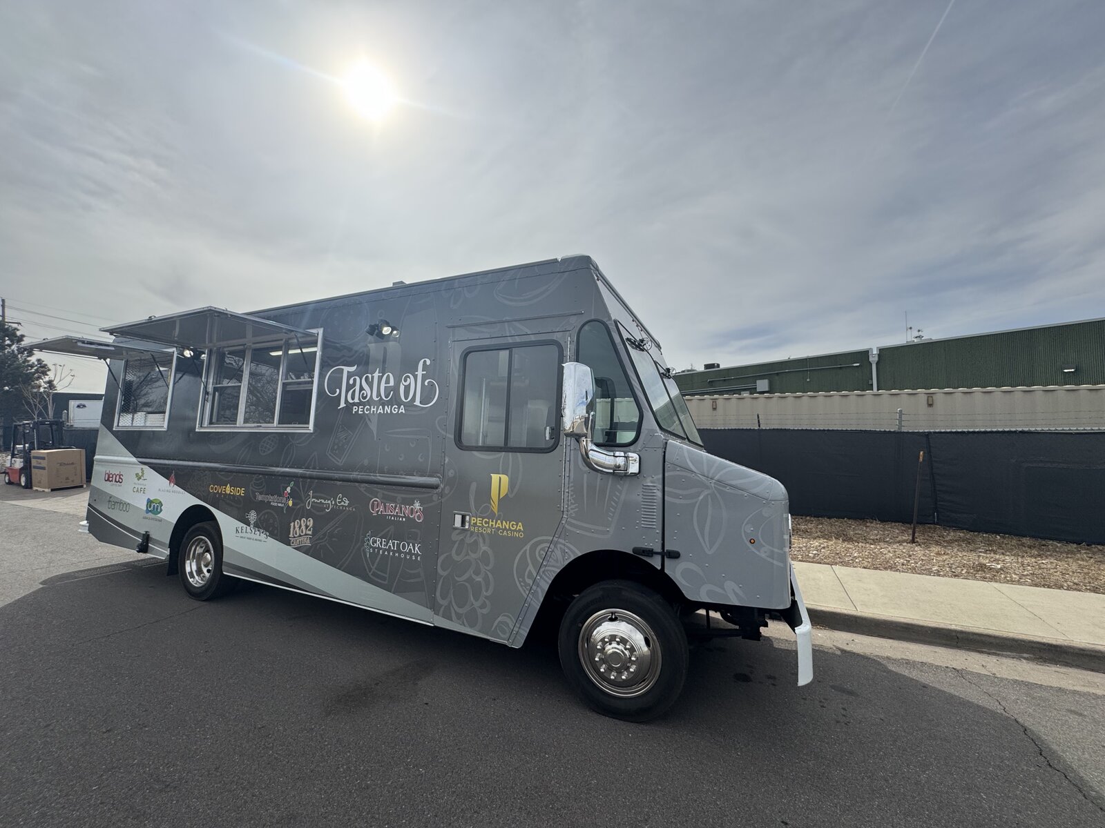 Taste of Pechanga food truck interior - stainless steel kitchen with Atosa refrigerator bank and hood with Ansul fire suppression