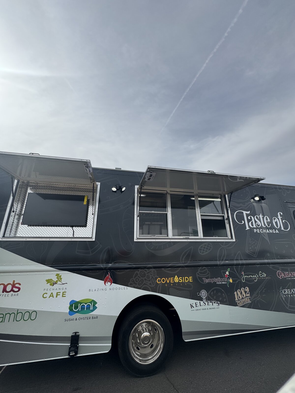 Pechanga casino food truck dual service windows open - Taste of Pechanga 18ft mobile catering build by Zion Foodtrucks