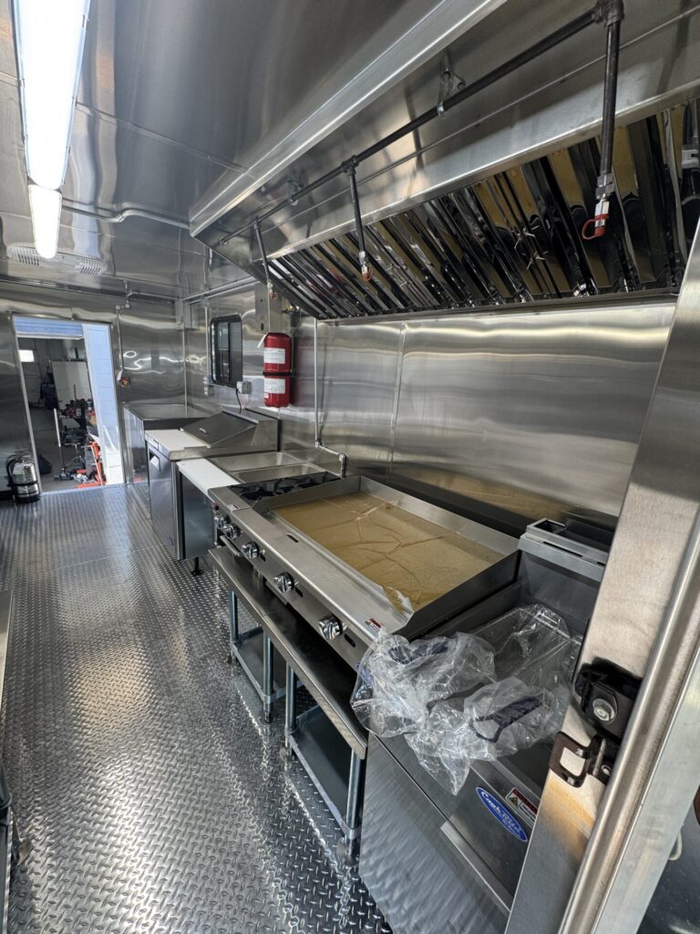 Stainless cooking line inside the Golden catering truck