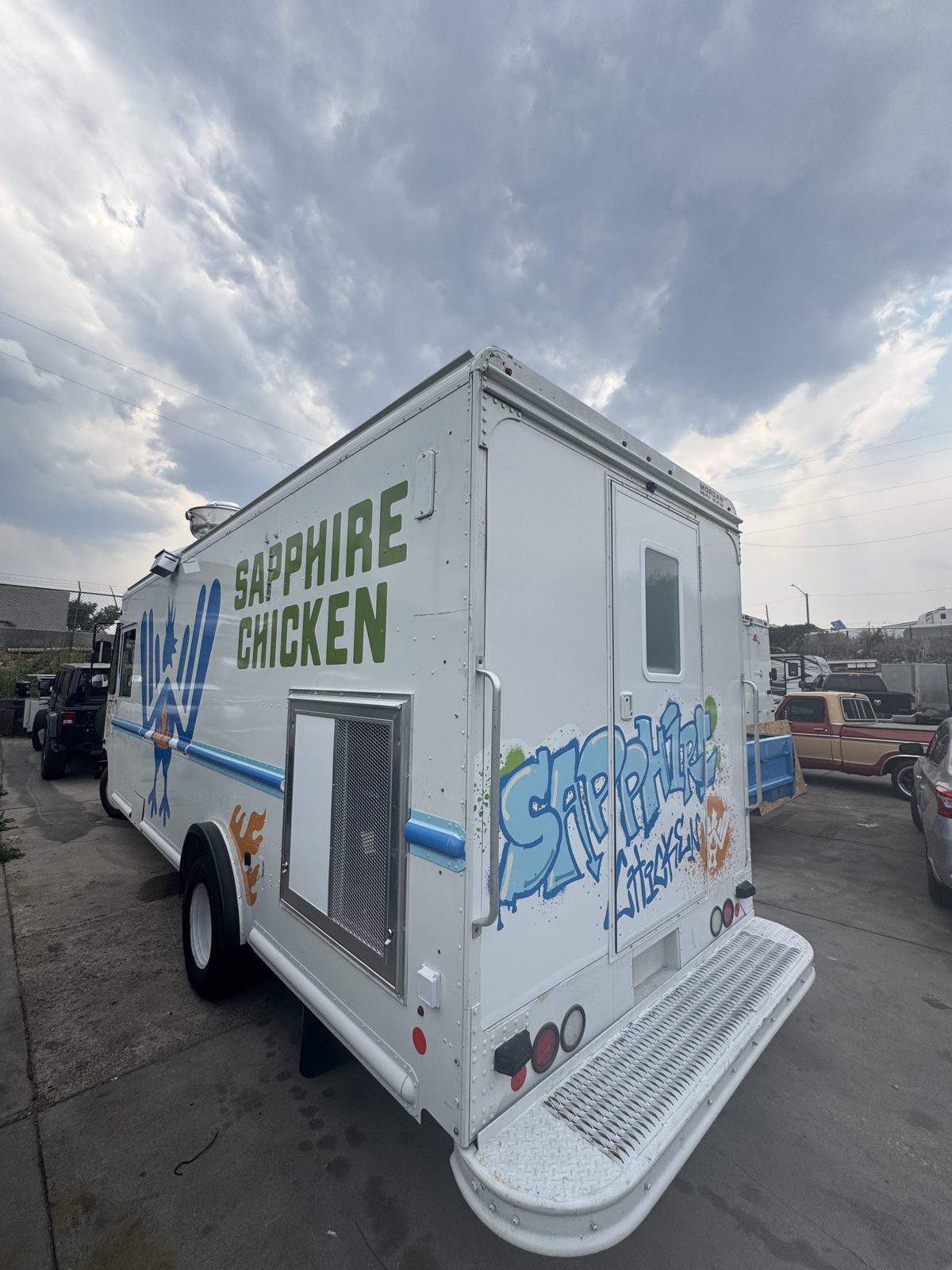 Rear graphics on the Sapphire Chicken food truck built for the Bitterroot Valley
