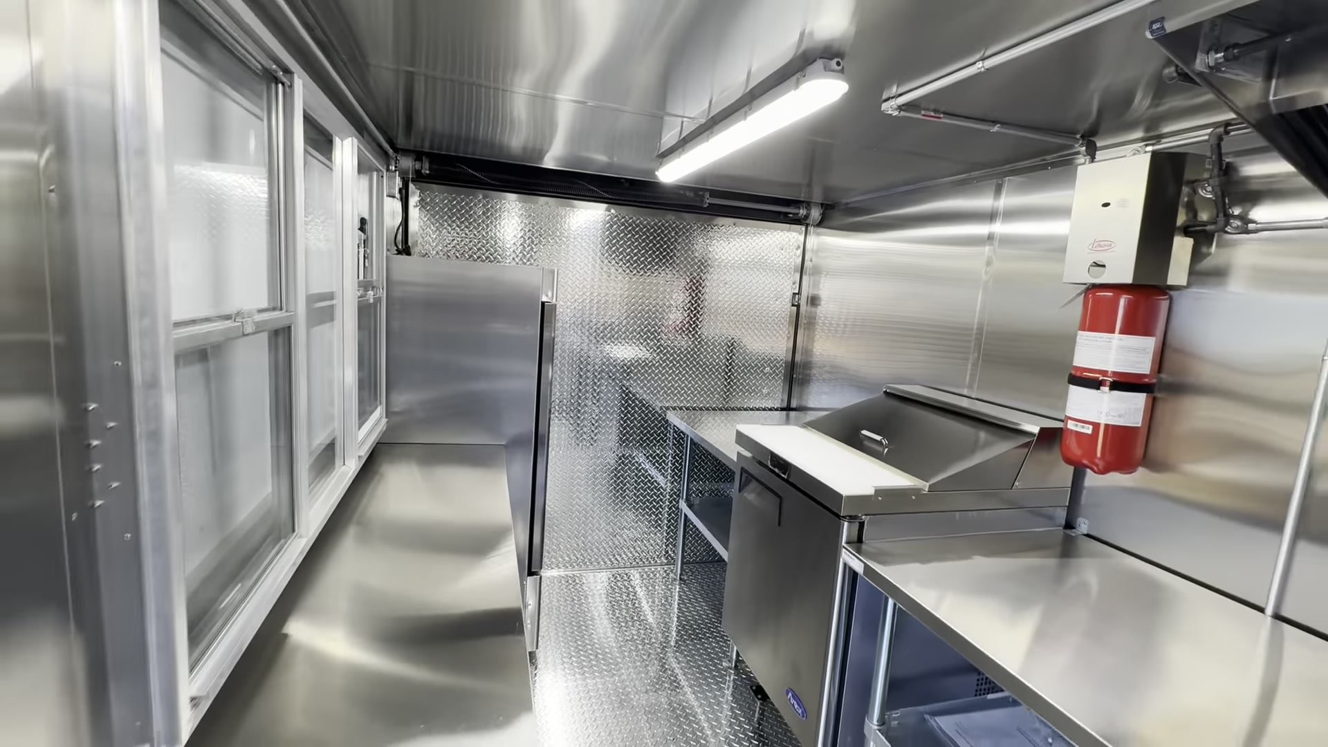 Interior of the 12ft food trailer, stainless throughout with a diamond plate floor