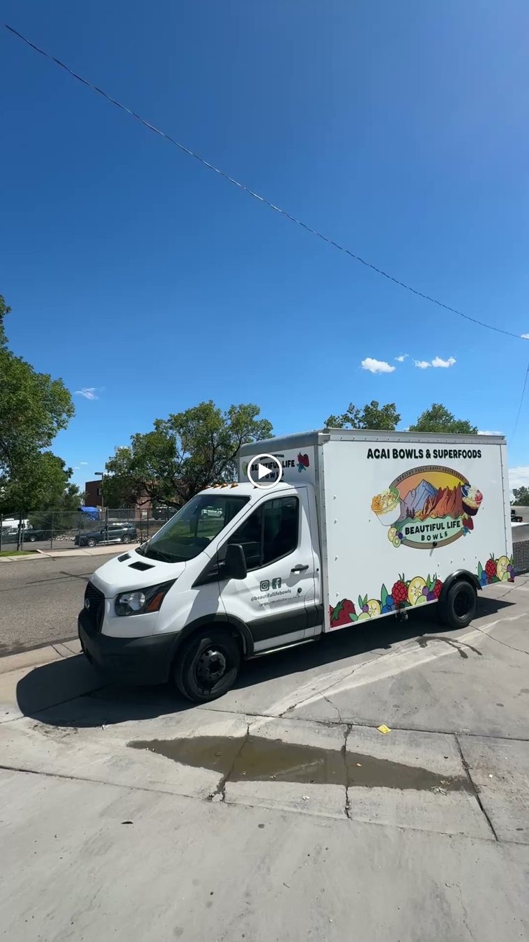 Front three quarter view of the açaí bowl food truck on a Ford Transit chassis
