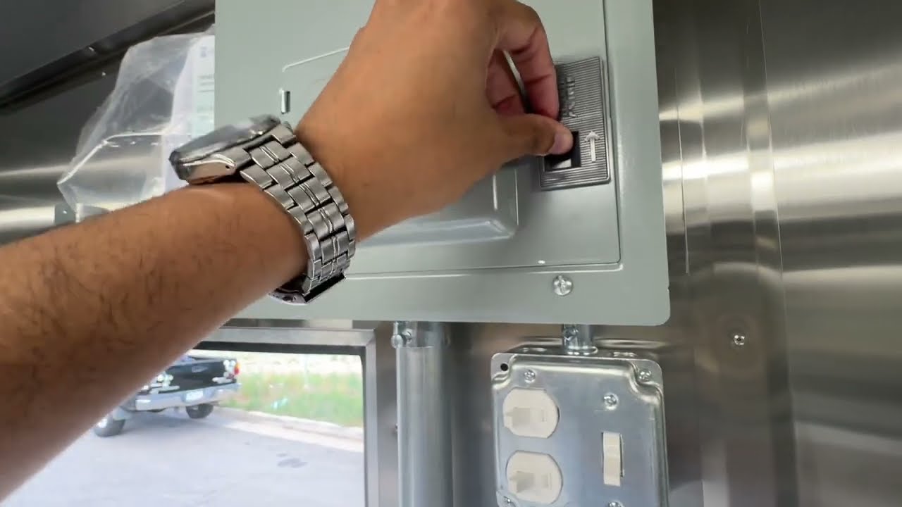 Breaker panel and outlet inside the 14 foot ski resort catering trailer