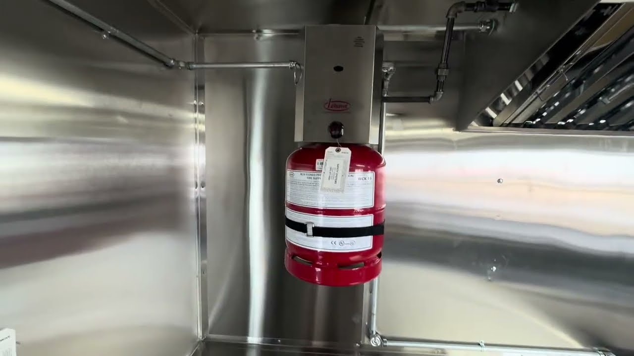 Class K fire extinguisher mounted inside an 18 foot food truck