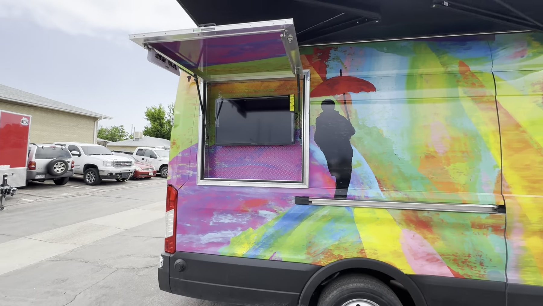 Side window and awning open on the mobile outreach van