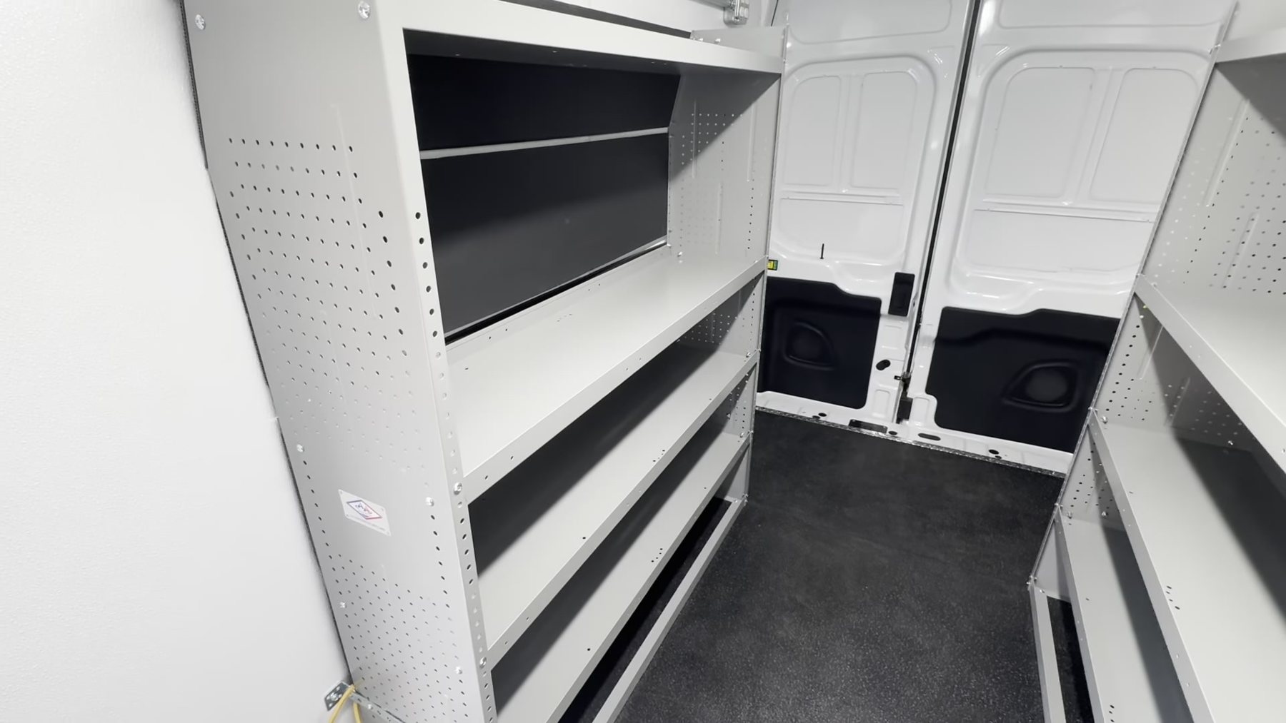 Cargo shelving inside the mobile outreach van for event kit